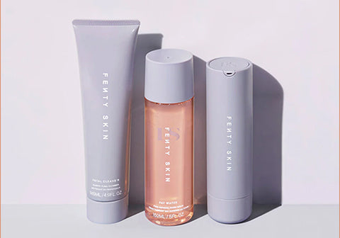 Product shot of Fenty Skin Starter Bundle that includes Total Cleanser, Fat Water Toner, and Hydra Vizor Sunscreen.